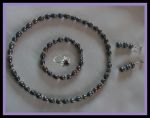 Набор украшений из крупных черных жемчужин с серебрянными вставками (4 предмета)